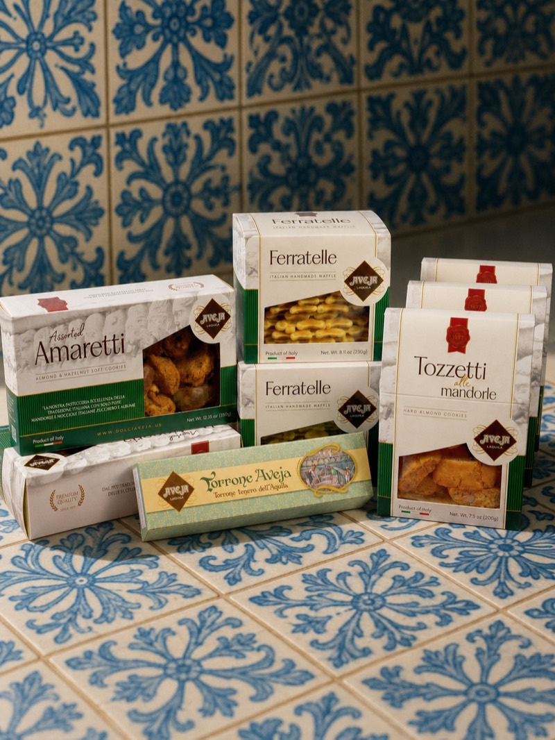Generated scene — the full product range on a blue-tiled Southern Italian floor